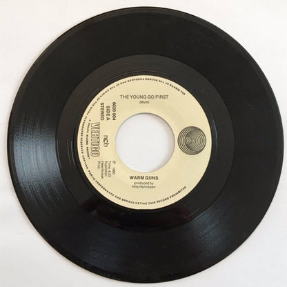 Warm Guns : The Young Go First (7", Single, Red)