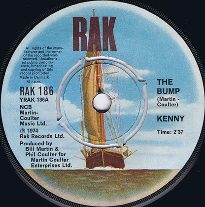 Kenny (3) : The Bump (7", Single, Yel)