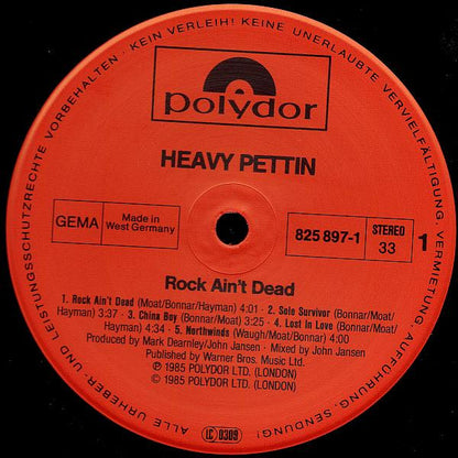 Heavy Pettin : Rock Ain't Dead (LP, Album)