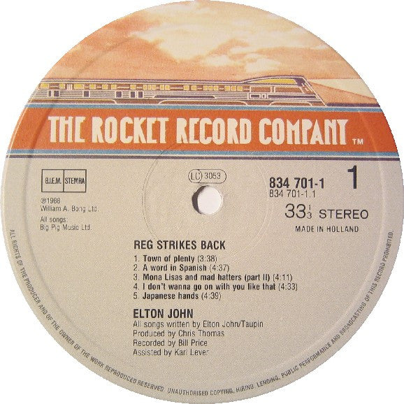 Elton John : Reg Strikes Back (LP, Album, Gat)